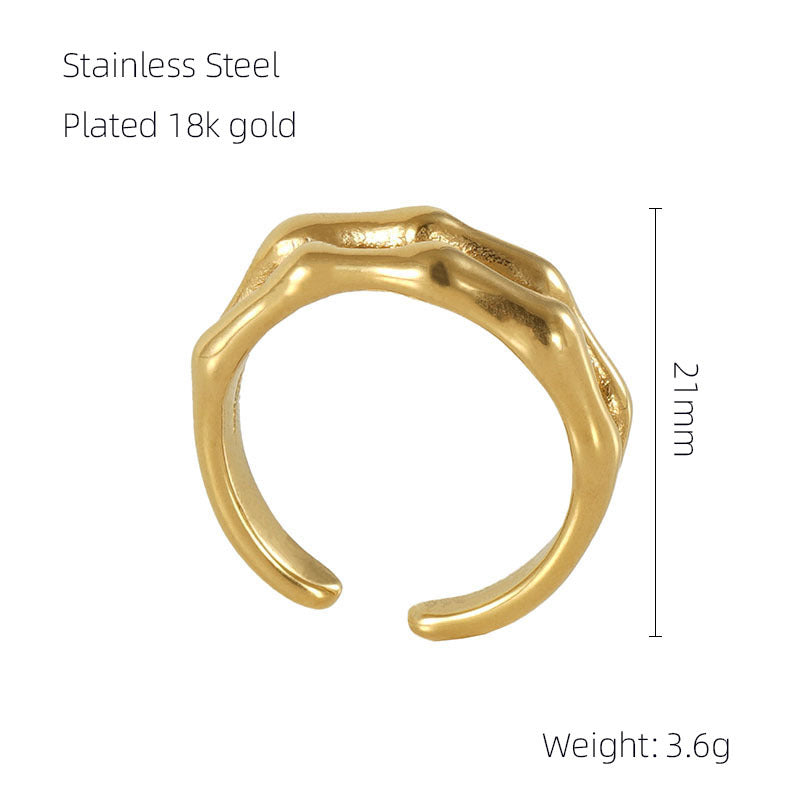 aurantia-ring-Gold ring with text indicating 'Stainless Steel Plated 18k gold' and dimensions on a white background.