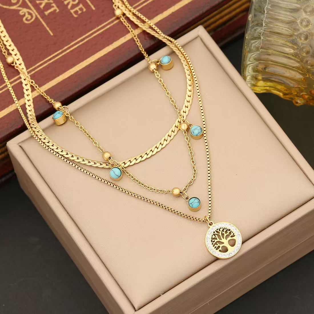 Emerald Cascade Necklace – gold-plated stainless steel with emerald stones 1