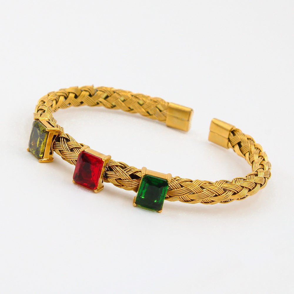 Heritage Royal Cuff Bangle – gold-plated stainless steel with emerald, ruby, and citrine stones”
	•	“Heritage Royal Bangle – braided gold cuff bracelet with colorful gemstones