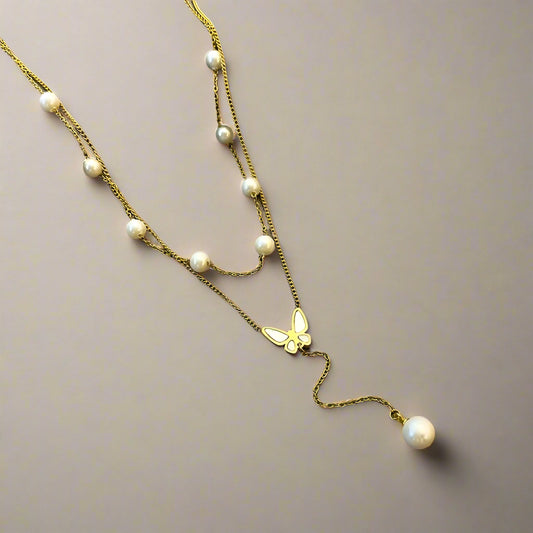 Luna Flutter Necklace – gold-plated chain with butterfly charm and pearls