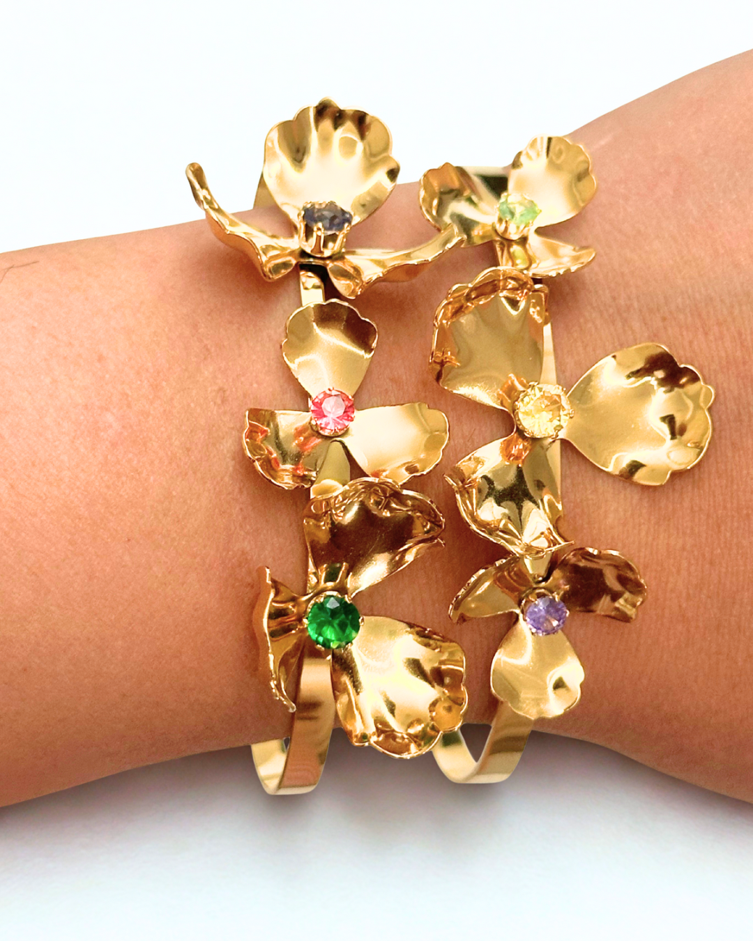 Opulence Bloom cuff bracelet with floral design in stainless steel, PVD gold plating, and colorful gemstone details