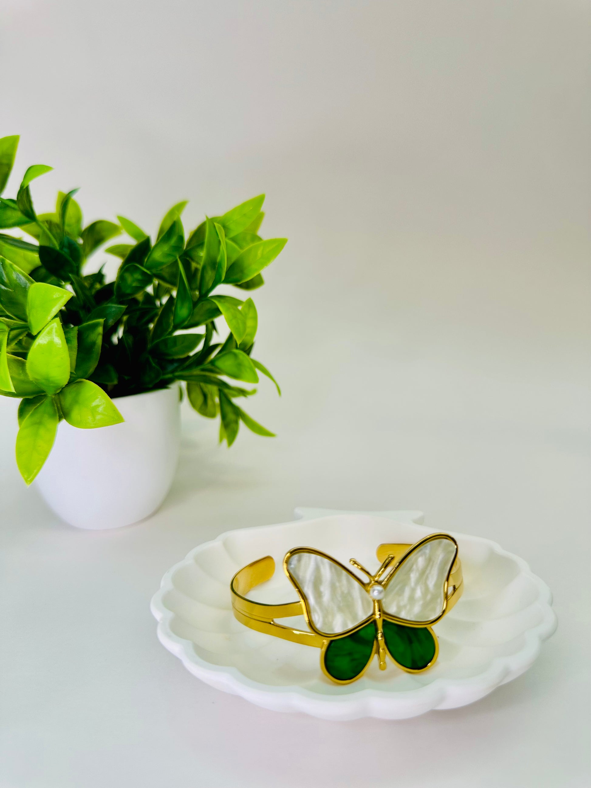 Opulence Papillon cuff bracelet with butterfly design in stainless steel, PVD gold plating, and enamel accents 2