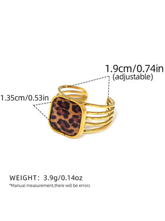 Gold ring with leopard print design and measurements on a white background